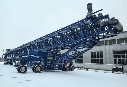 What is the Function of a Stacking Conveyor?